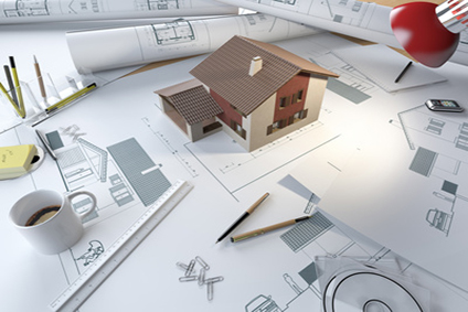 architect drawing table with 3d model